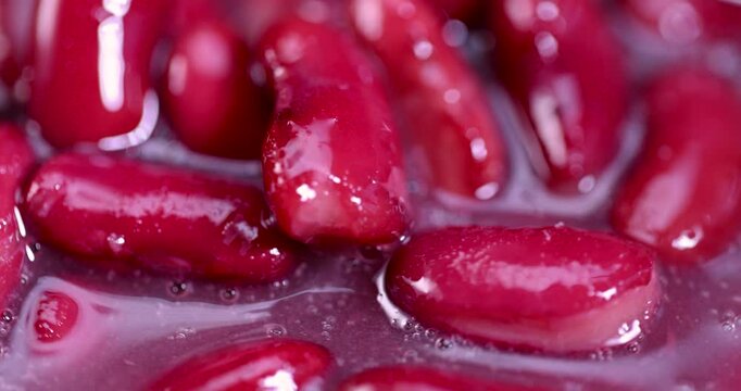 red canned beans in close-up, open canned red beans in brine