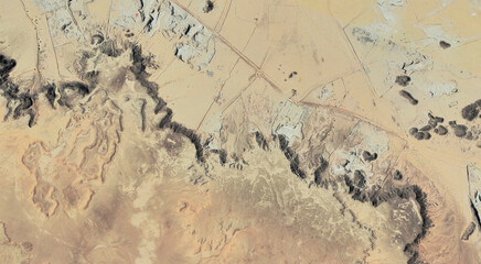 The landscape of the sandy desert in Qatar from a bird's eye view