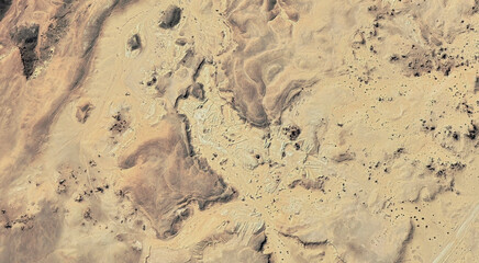 The landscape of the sandy desert in Qatar from a bird's eye view