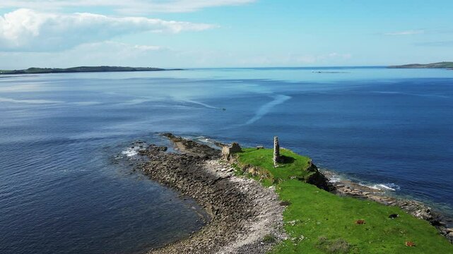 The Ruined Castle at Killybegs, Ireland, with only a wal standing on the ST John's Peninsula