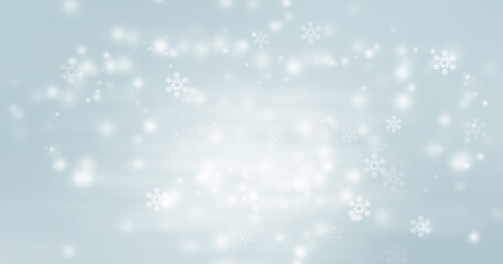 Blurred glitter effects background. Bright soft blue with hints of pearl color. Christmas background. Festive Christmas backdrop with holiday charm. Blurred bokeh light on dark blue background.