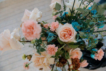 A detailed closeup view of an exquisite bouquet of beautiful flowers carefully arranged and displayed within a decorative vase