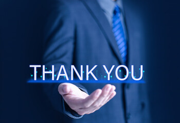 Businessman using laptop and showing thank you message on display. Concept of congratulation,...