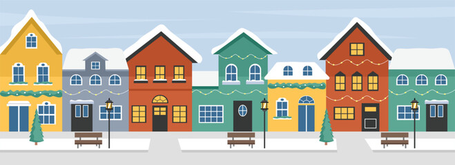 Home in the winter season. Winter landscape. Winter city scene. Christmas town. Houses street with snowfall. Christmas building. Winter building. City building.