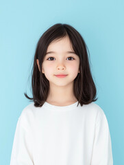 Portrait of a Cute Little Girl in a Simple Sweatshirt