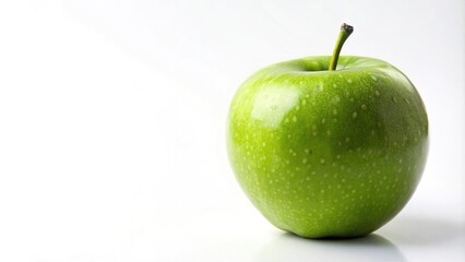 Green apple on a white background isolated at a tilted angle