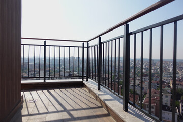 Breathtaking HighRise Balcony View Offering a Spectacular Overlook of the Cityscape