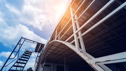 Fototapeta premium A structure featuring wooden slats on construction site contributing to its architectural style