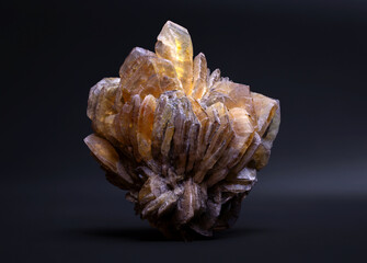 Yellow calcite mineral crystals captured in stunning detail, highlighting their vibrant color and...
