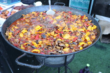 A Vibrantly Colorful Mixed Vegetable Paella Cooked in a Large Pan Ready for Serving