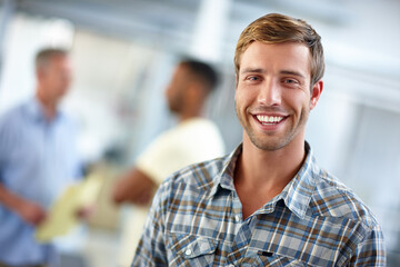 Obraz premium Happy man, portrait and creative in office for business, career development and exciting new project. Designer, smile and confident in agency for marketing startup, collaboration and pride with team