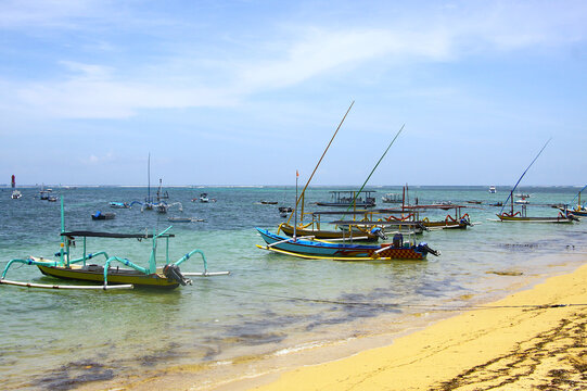 Traditional boats, Jukungs, along the Sanur Beach in Bali, Indonesia 