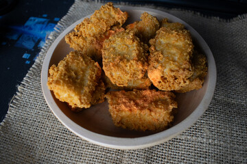crispy tofu in a wooden bowl