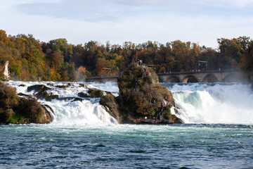 Fototapeta premium Rhine Falls view from boat. The largest waterfall in Europe, located on the border of Switzerland and Germany