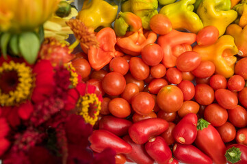 Red and orange flowers and vegetables