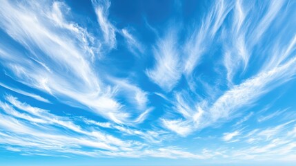 Serene Blue Sky with Wispy Clouds