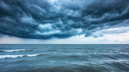 Fototapeta premium Dramatic Ocean Scene Under Dark Cloudy Sky