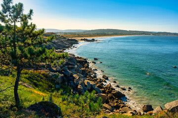 Beach Lanzada at sunset on the Galician coast of Grove, Spain.