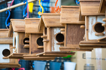 Wooden Birdhouses with Cozy Design, Hanging in a Garden Setting
