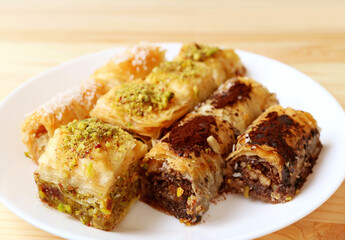Assorted Mouthwatering Baklava Pastries Served on Wooden Table