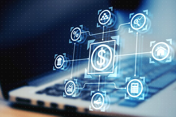 Digital dollar and finance-related icons hovering over a laptop keyboard in a virtual interface, technology concept.