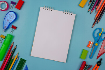 Open book mockup with stationery on a background