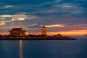 Fototapeta premium The sunset scenery at night on the seaside of Penglai District, Yantai, Shandong, China