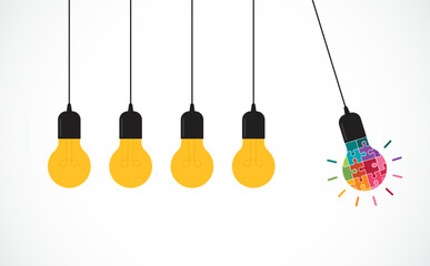 Hanging light bulbs with one glowing on white background. Concept of idea