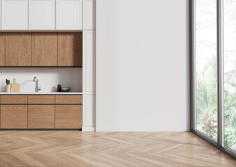 Stylish home kitchen interior with cooking cabinet and window, mockup wall