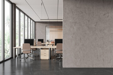 Modern office interior with coworking and meeting space, window. Empty wall