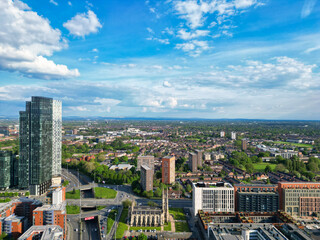 Aerial View of Greater Manchester City Centre and Tall Buildings During Golden Hour of Sunset....