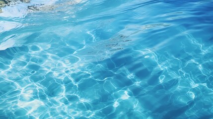 Obraz premium Crystal clear blue water reflecting sunlight beautifully.