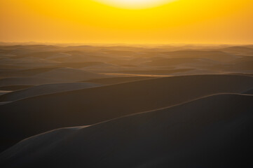 sunset sunrise with beautiful shadow cast on the desert sand dune