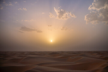 sunset sunrise with beautiful shadow cast on the desert sand dune