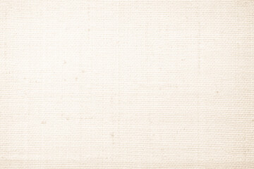 Closeup detail of beige fabric texture background. High resolution photo.