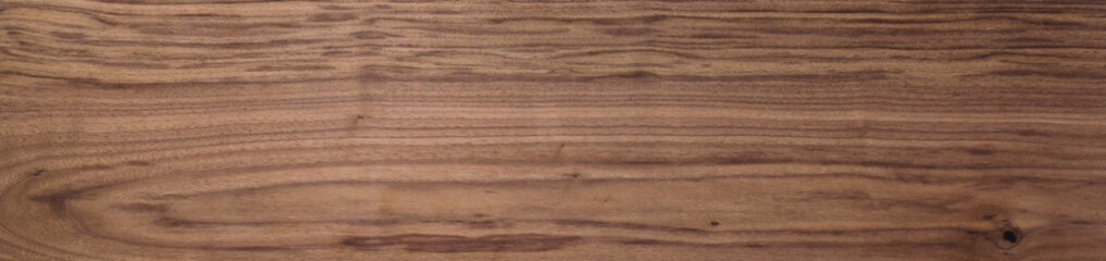 Black walnut wood texture of solid board untreated