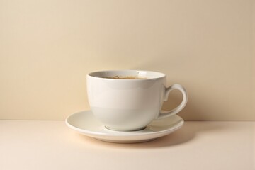 Fototapeta premium Coffee cup on a pastel surface with smooth composition