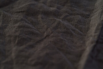 Dark gray linen napkin background