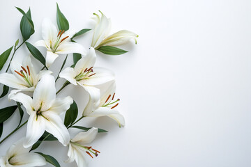 Obraz premium Close-up of White Lilies on a Pristine White Background: A Striking Floral Display for Weddings, Celebrations, and Designs