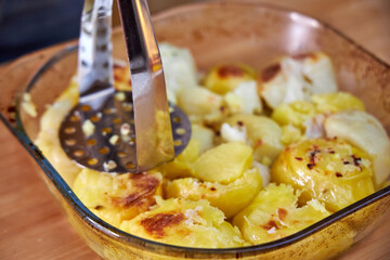 cooks baked potatoes for mashed potatoes