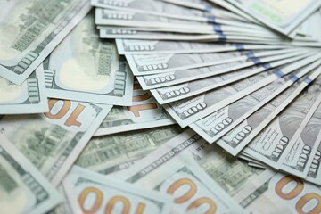 Big amount of american USD hunderd dollar bills banknotes close up