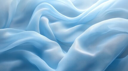 Obraz premium Gentle blue waves of silk fabric flowing gracefully against a soft, misty background