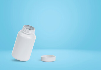 Blank plastic pill bottle on a light blue background