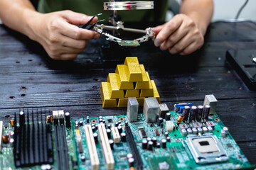 Technicians meticulously repair electronic components to turn them into precious gold. This process...