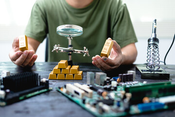 Technicians meticulously repair electronic components to turn them into precious gold. This process...