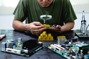 Technicians meticulously repair electronic components to turn them into precious gold. This process...
