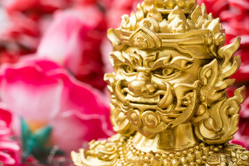 Samut Prakan, Thailand - June, 12, 2024 : Statue of Golden Thao Wessuwan Statue at a Thai Temple, Symbol of Wealth and Power at Samut Prakan, Thailand.