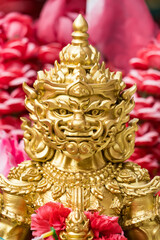 Samut Prakan, Thailand - June, 12, 2024 : Statue of Golden Thao Wessuwan Statue at a Thai Temple, Symbol of Wealth and Power at Samut Prakan, Thailand.