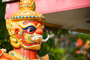 Samut Prakan, Thailand - June, 12, 2024 : Statue of Golden Thao Wessuwan Statue at a Thai Temple, Symbol of Wealth and Power at Samut Prakan, Thailand.