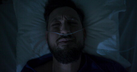 Patient waking up in hospital bed with a headache post-surgery, feeling disoriented but hopeful for recovery.